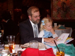 Daddy and Elizabeth reading Dr, Seuss Easter 2009