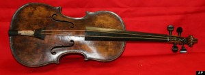 The violin of Wallace Hartley the bandleader of the Titanic. Found tied to his body when he was recovered. Photograph by AP