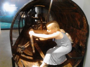 Elizabeth inside a full size replica of the Hunley.