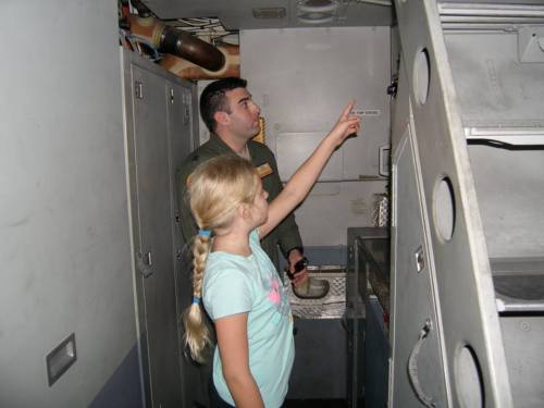 Elizabeth asking Captain Chris yet another question